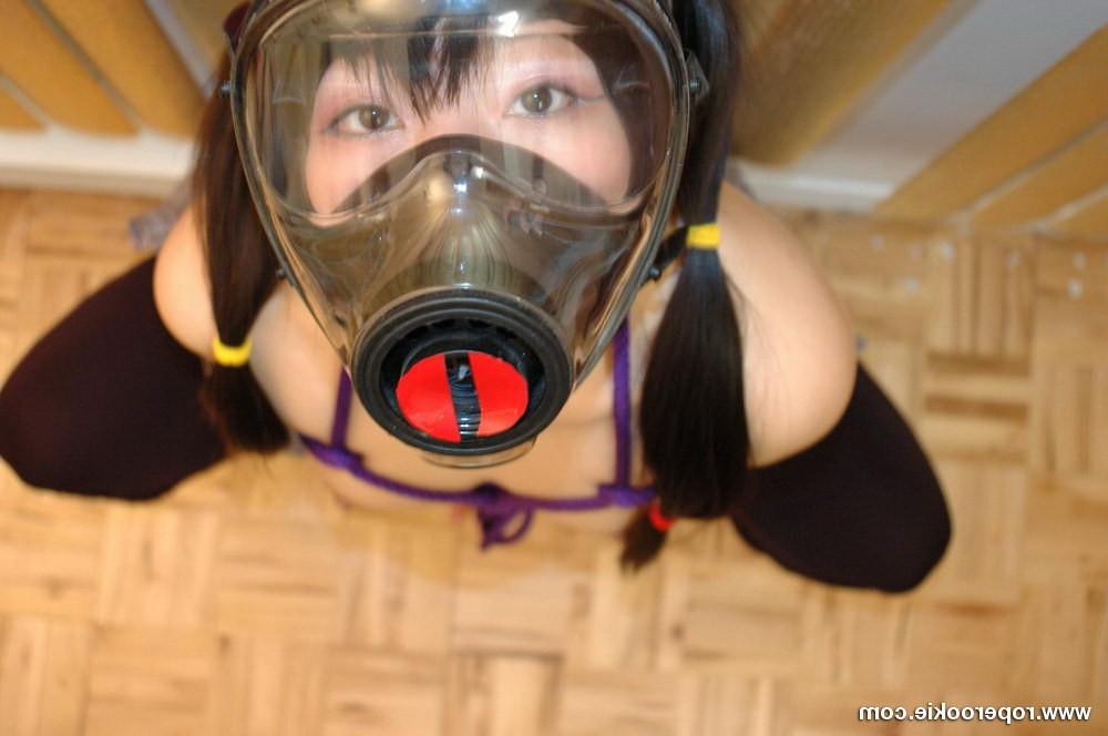 15P Yumi bound while in a gaz mask