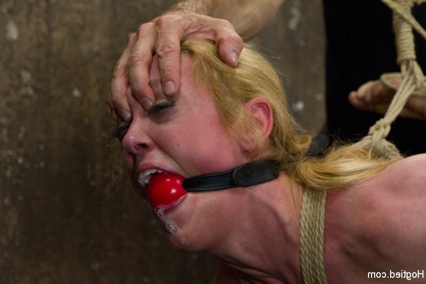 16P A busty blonde gets hogtied and her tits bound