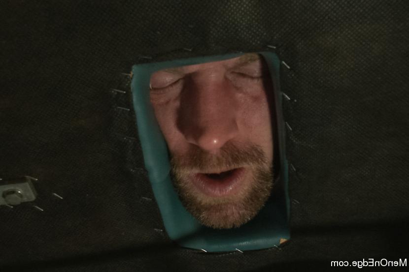 15P Adam Herst has his huge cock edged while bound in a straight jacket inside a pad
