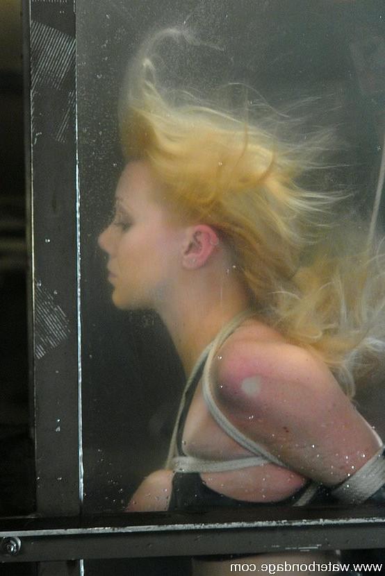 15P Samantha Sin blonde is bound dunked in watertank and toy fucked