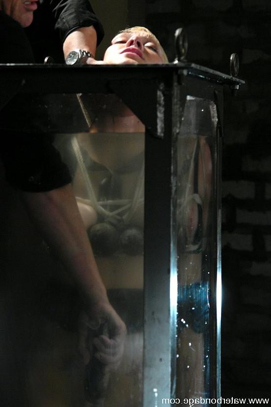 15P Samantha Sin blonde is bound dunked in watertank and toy fucked