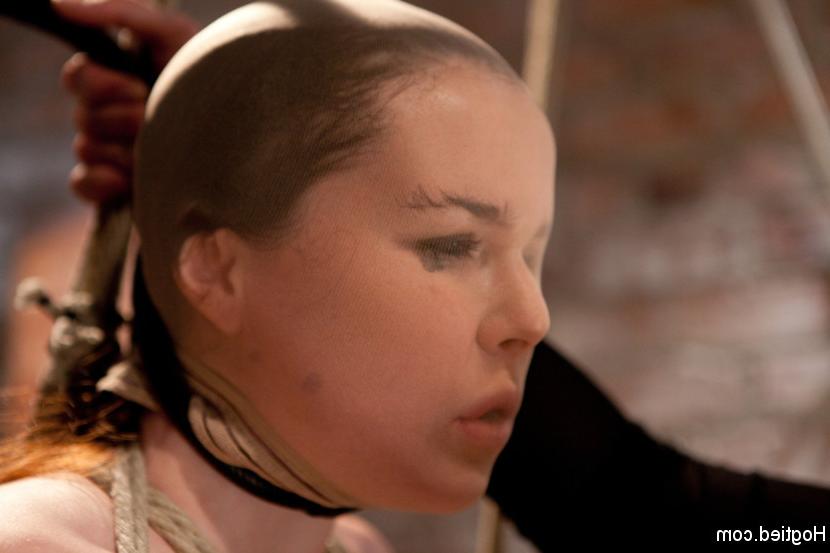 16P AnnaBelle Lee redhead is bound and made to ride the wooden pony