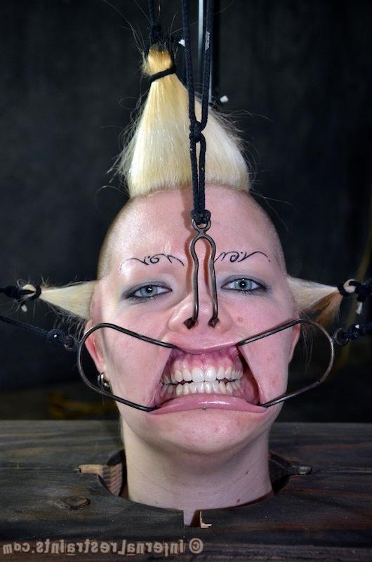 16P Denali Winter in cage is bound and spanked her tits exposed