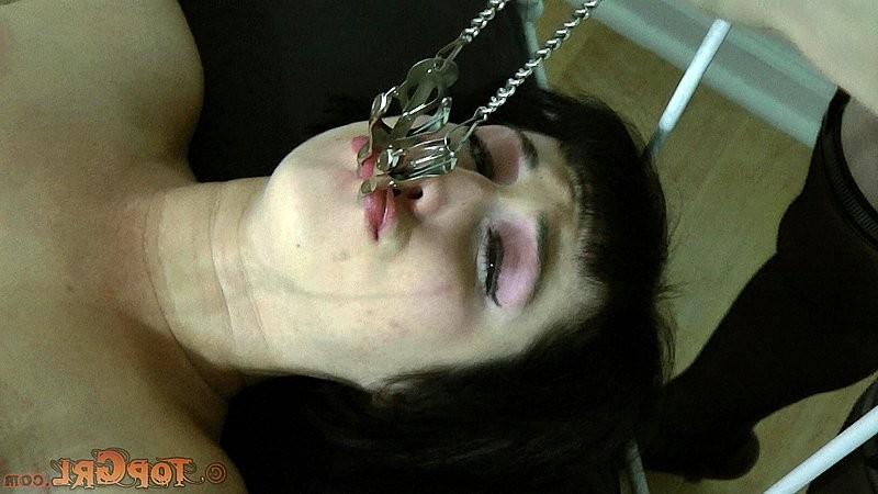 16P Niki Nymph is rope bound with tits exposed and gagged by lezdom