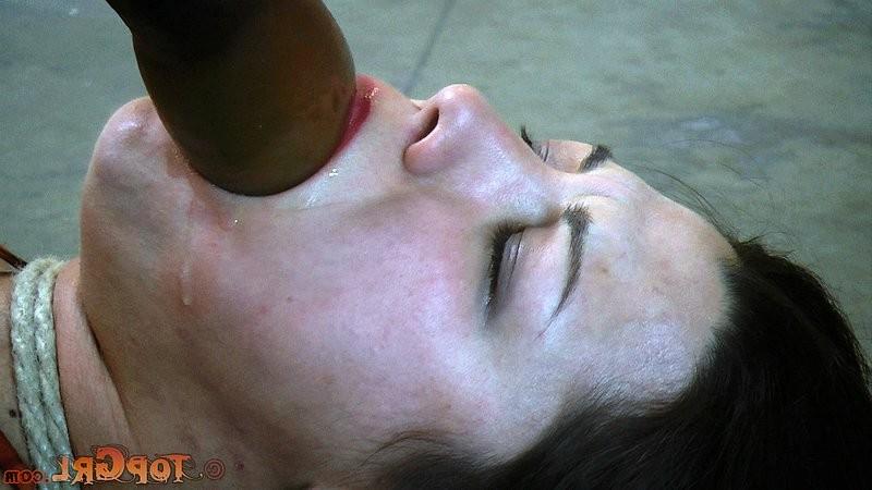 16P Dana Vixen busty babe is lying naked bound on a cold floor