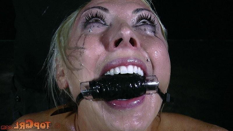 16P Skylar Price blonde subgirl is rope bound her big tits exposed 