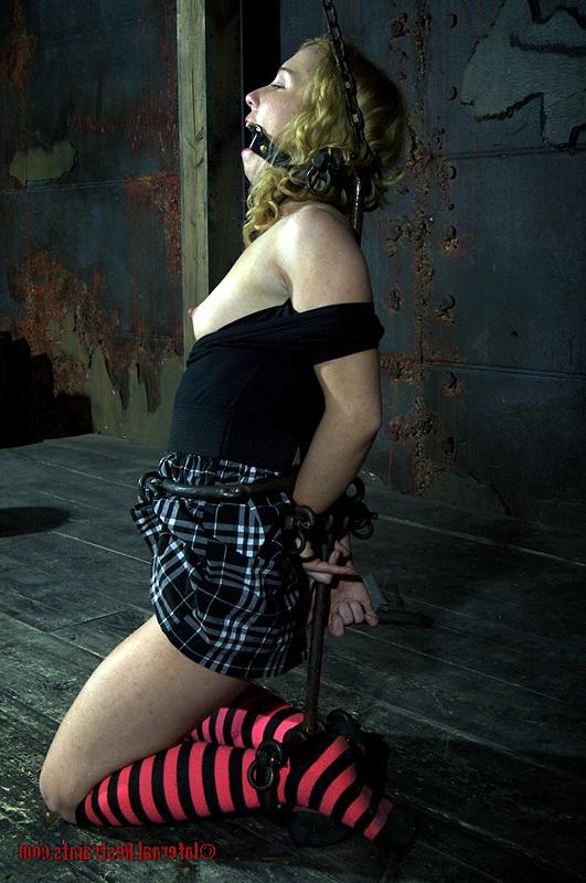 16P Nicki Blue is about to learn the true meaning of sadistic bondage. She has no c