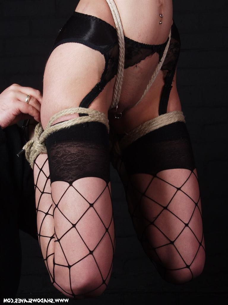 15P Skinny blonde slavegirl is bound in ropes and suspended