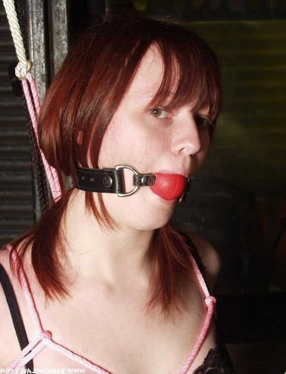 15P Cute redhead bound in pink rope