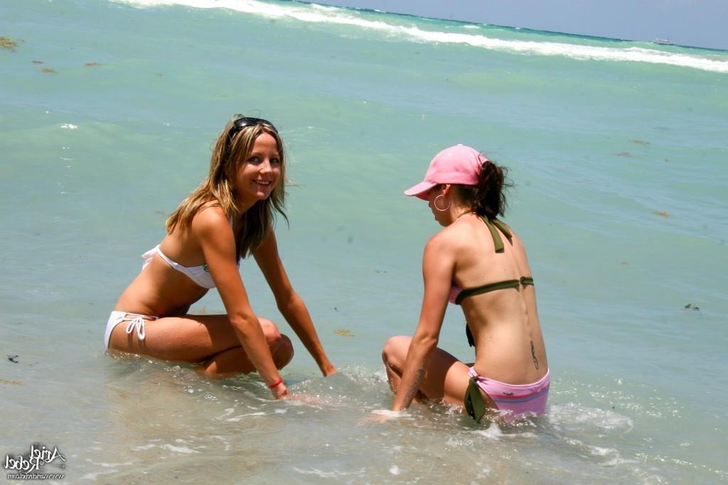 16P Two bikin beach girls playing