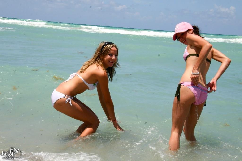 16P Two bikin beach girls playing