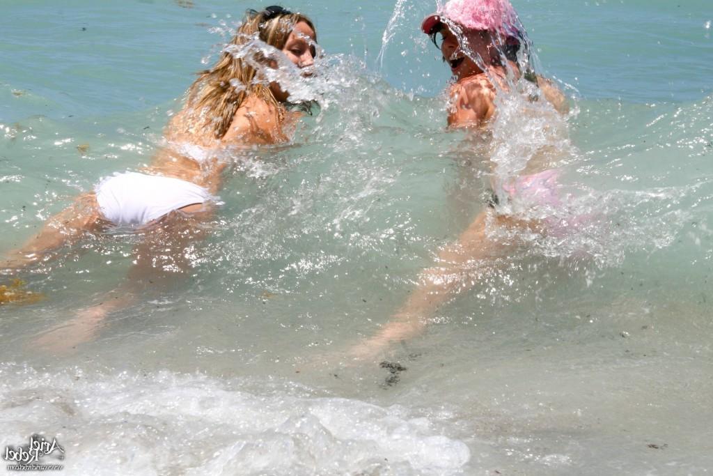 16P Two bikin beach girls playing