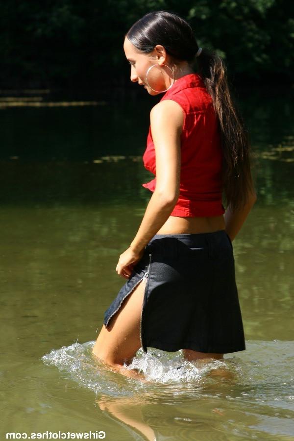 20P Sexy girl swimming with her soaked sticky clothes on