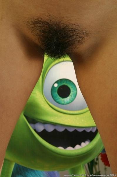 15P Sweet and exotic Nicole poses sexy with a freek one eyed friend