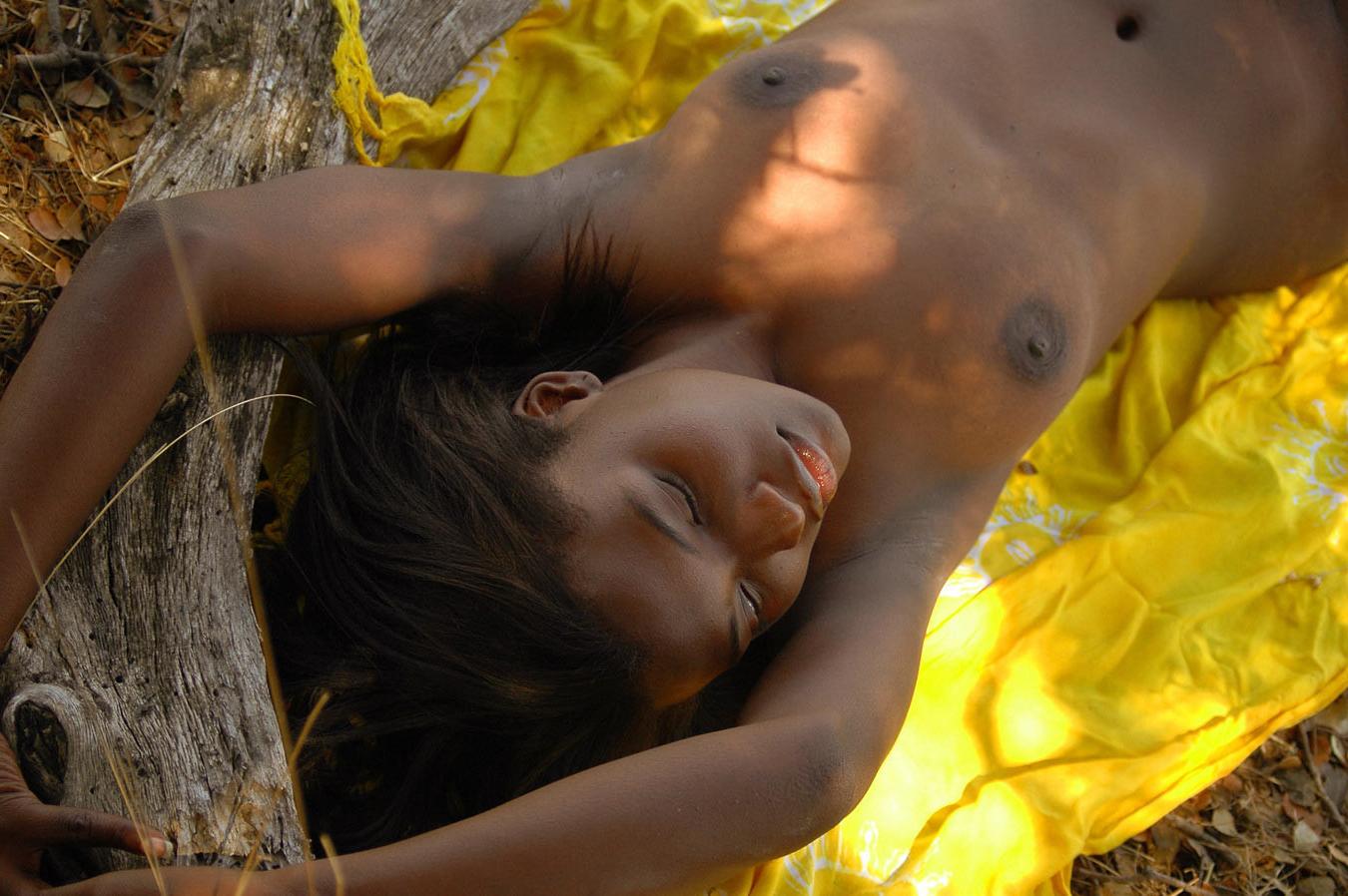 15P Cute black ethnic girls nude shaven pussy outdoors