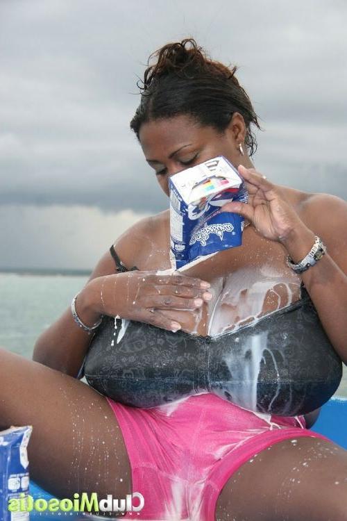 16P Ebony pornstar Miosotis getting her huge natural tits in milk