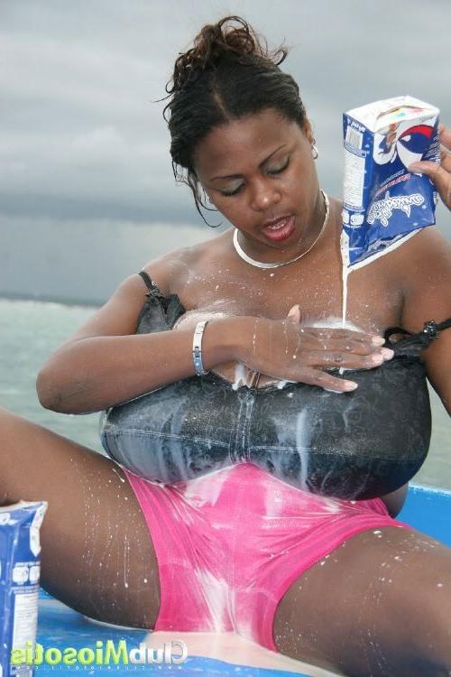 16P Ebony pornstar Miosotis getting her huge natural tits in milk