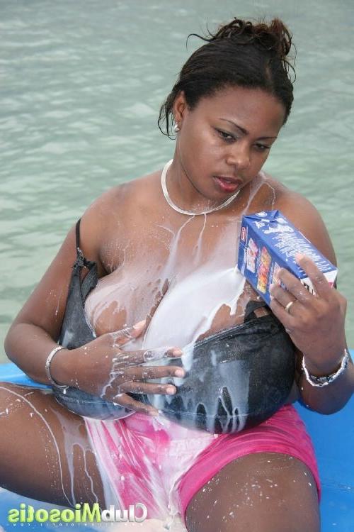 16P Ebony pornstar Miosotis getting her huge natural tits in milk