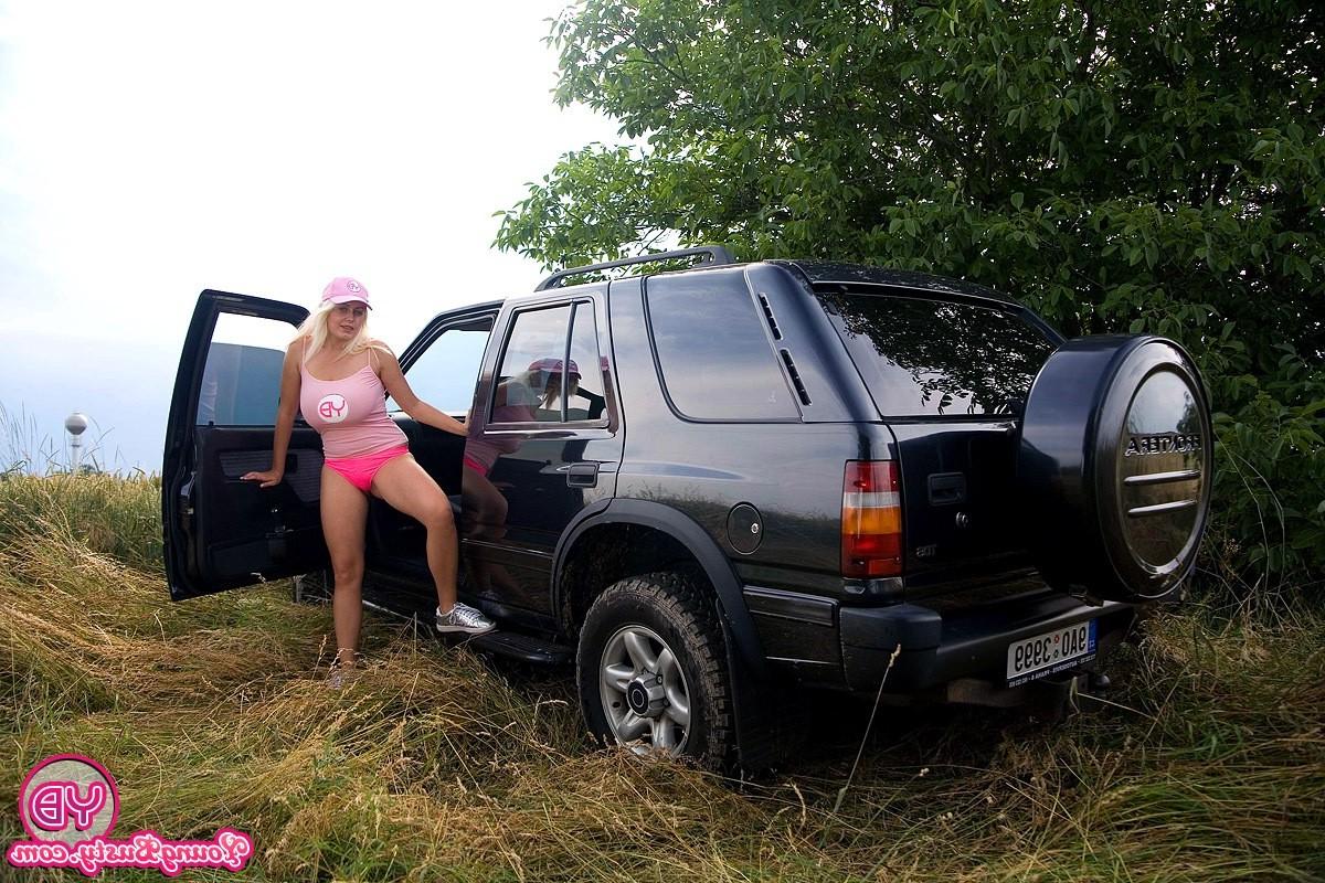 14P Blonde cutie with huge natural  tits toys pussy outdoor