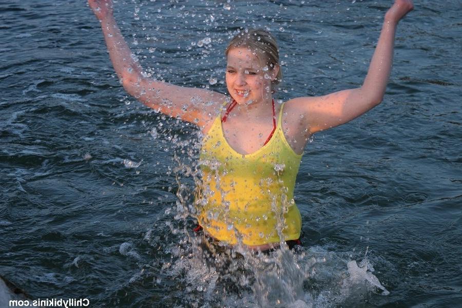 15P Bikini babe goes ice swimming with clothes on