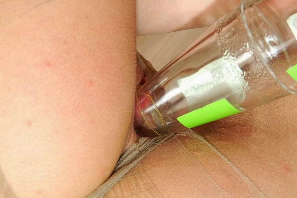 14P teen fucking her pussy with a bottle