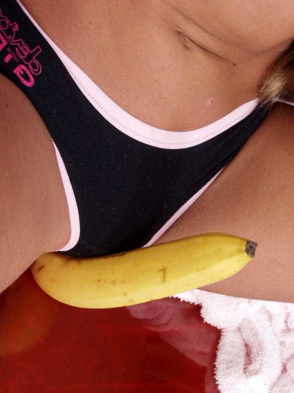 15P Pigtailed angel playing with banana