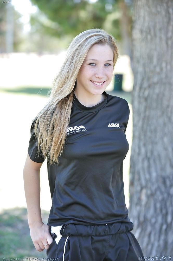15P Blonde babe in soccer uniform outside