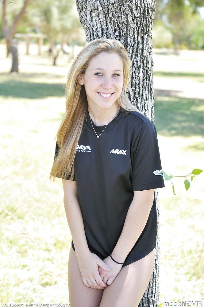 15P Blonde babe in soccer uniform outside