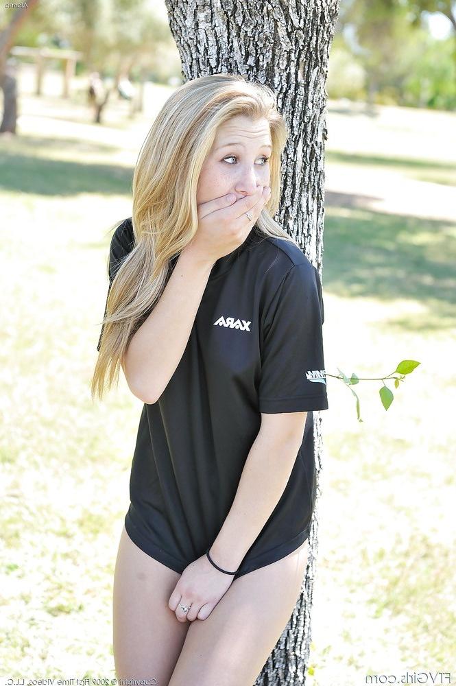 15P Blonde babe in soccer uniform outside