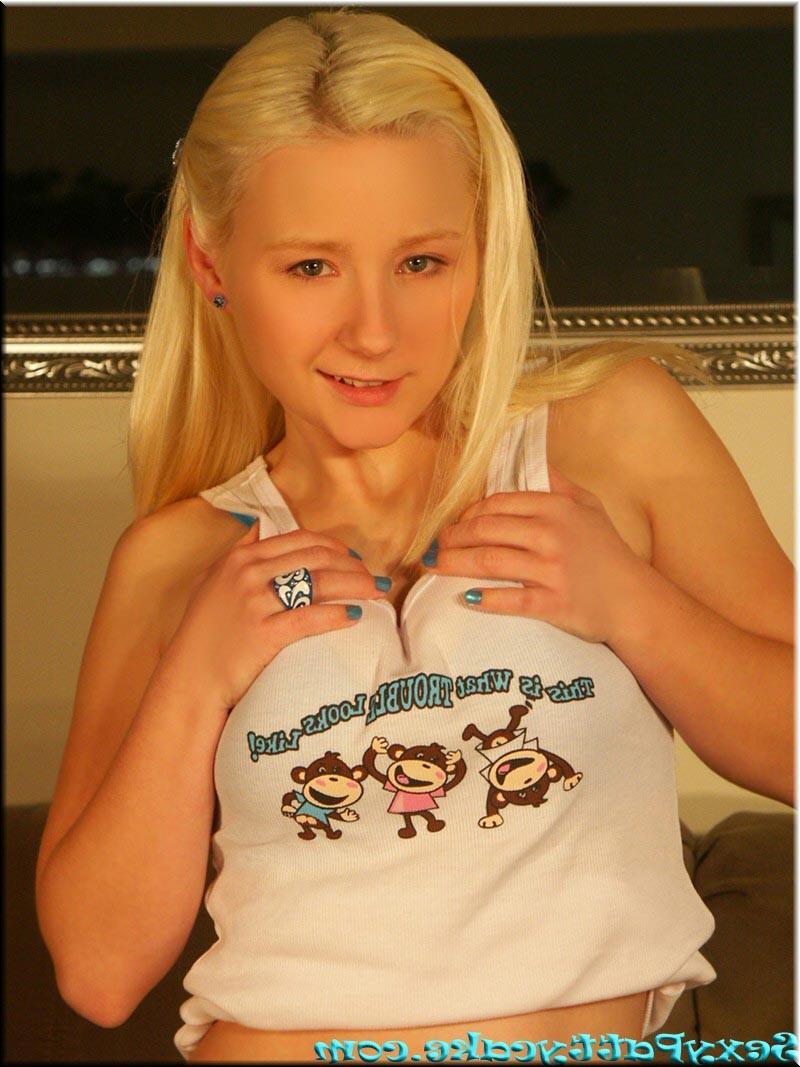 16P Busty blonde teen eating a banana