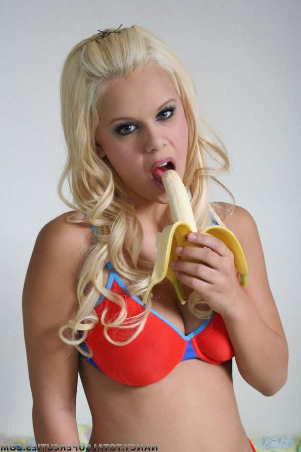 16P Busty blonde coed licking a ripe banana