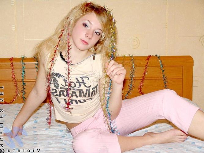 4P An innocent blonde amateur teen stripping on a bed /