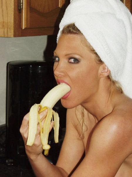 16P Mature blonde licks a big banana