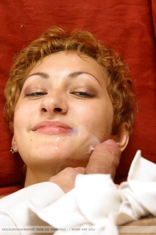 15P Nubile redhead gets a messy facial