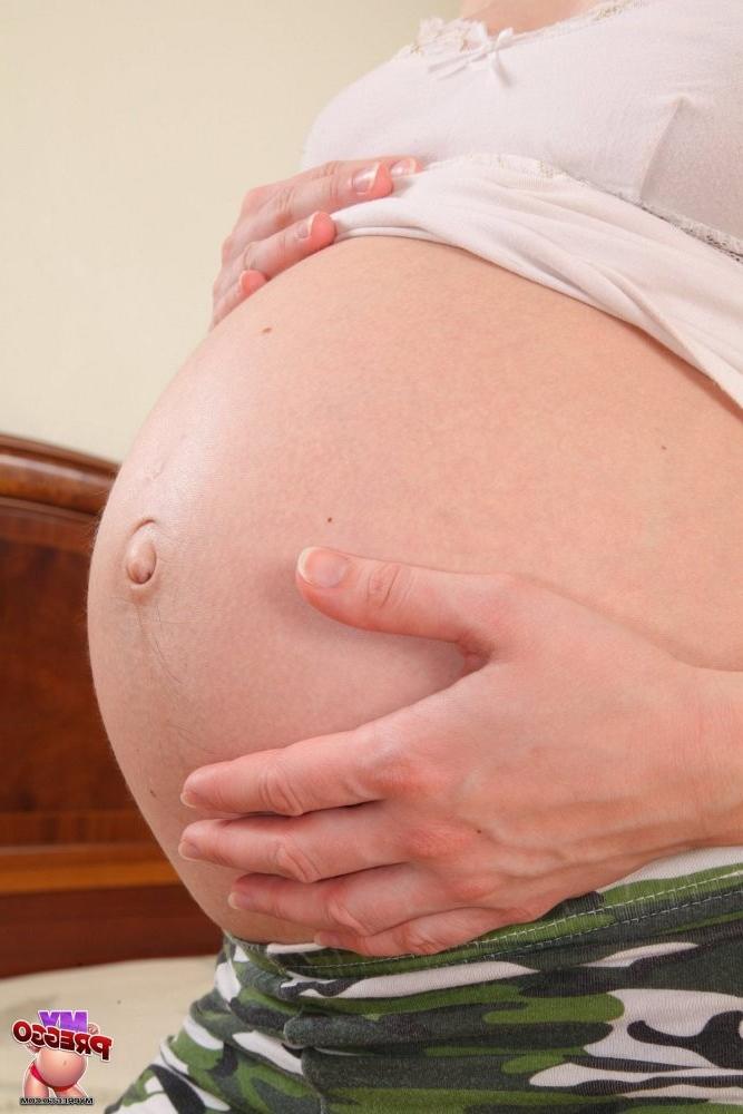 15P Pregnant teen strips nude