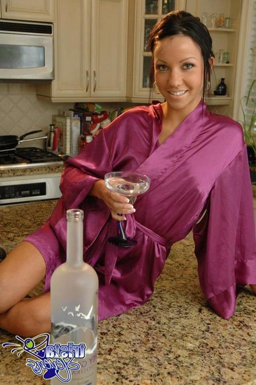 17P Young exciting babe stuffing her wet pussy with a vodka bottle