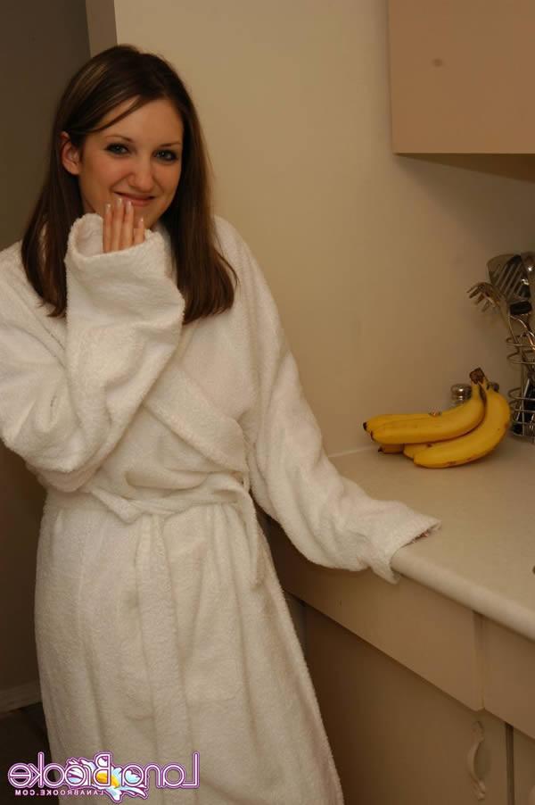 15P Busty brunette deep throats a banana
