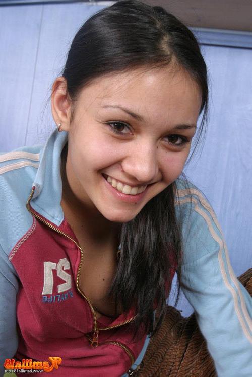 17P Tempting brunette teen shows her tanned nude body