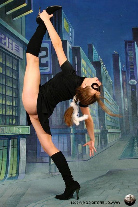 17P Flexible female dancer in sexy black boots