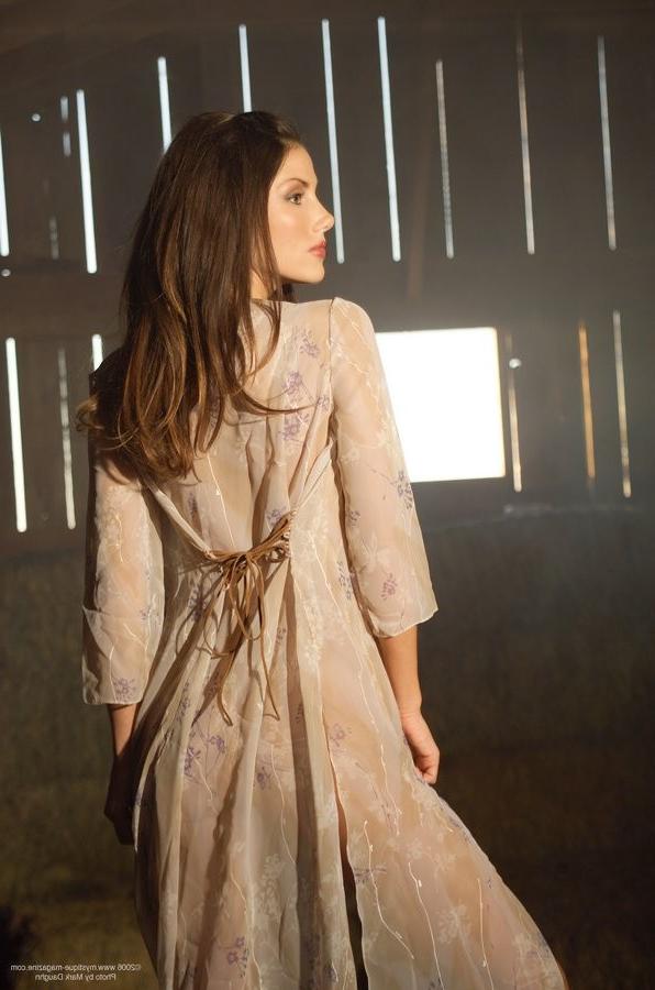 15P Diana Kauffman leggy busty babe strips in the barn