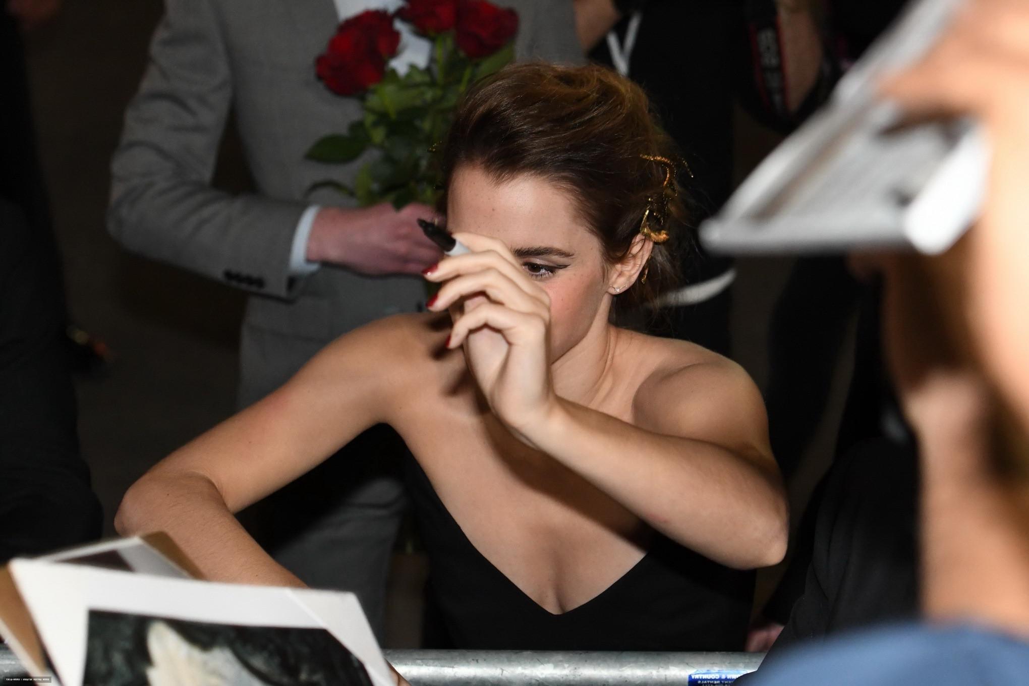 16P Emma Watson braless showing huge cleavage