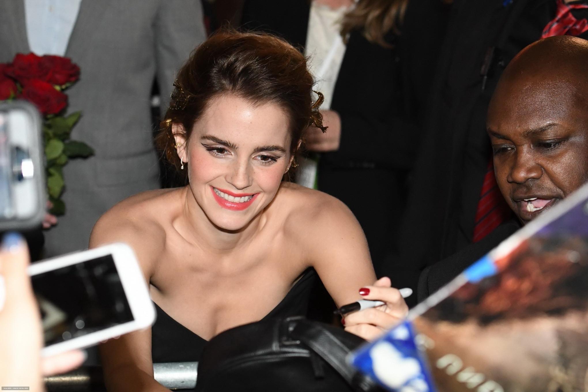 16P Emma Watson braless showing huge cleavage