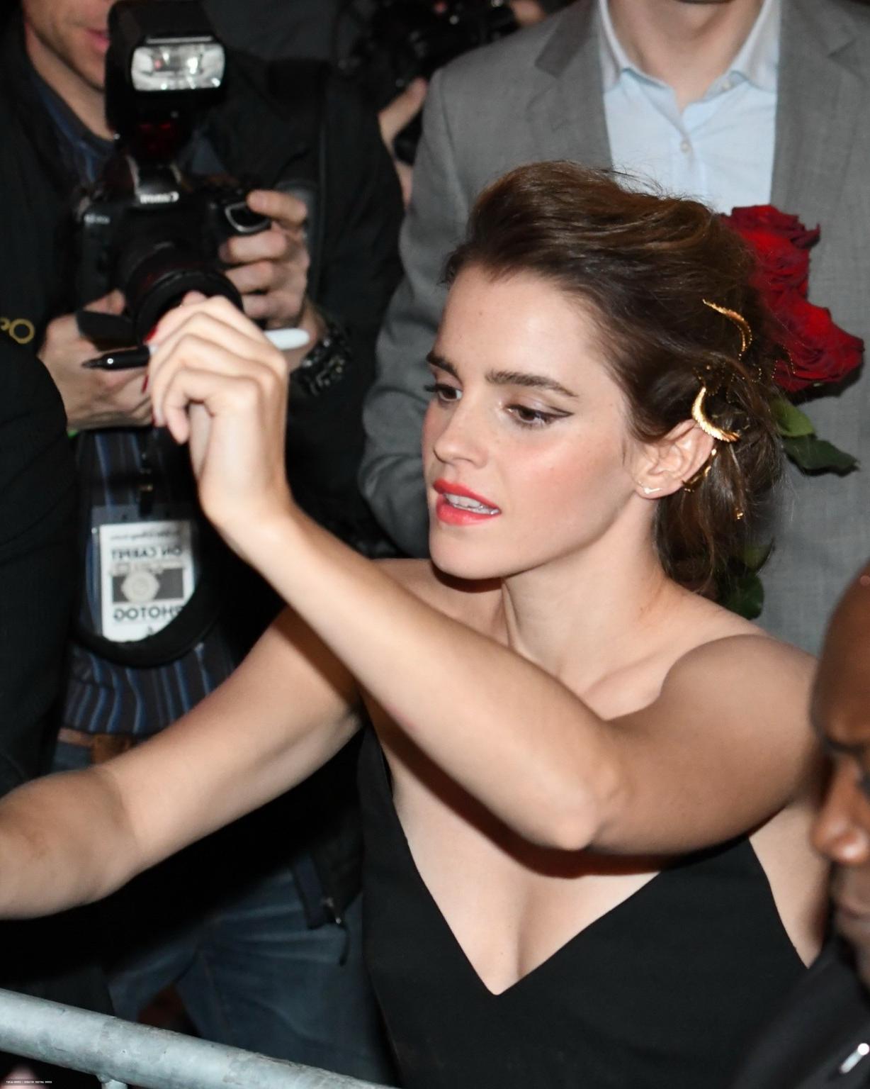 16P Emma Watson braless showing huge cleavage