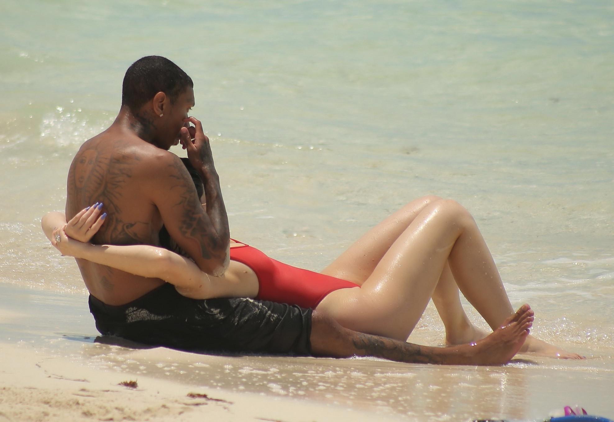 16P Kylie Jenner shows off her hot round ass in red swimsuit