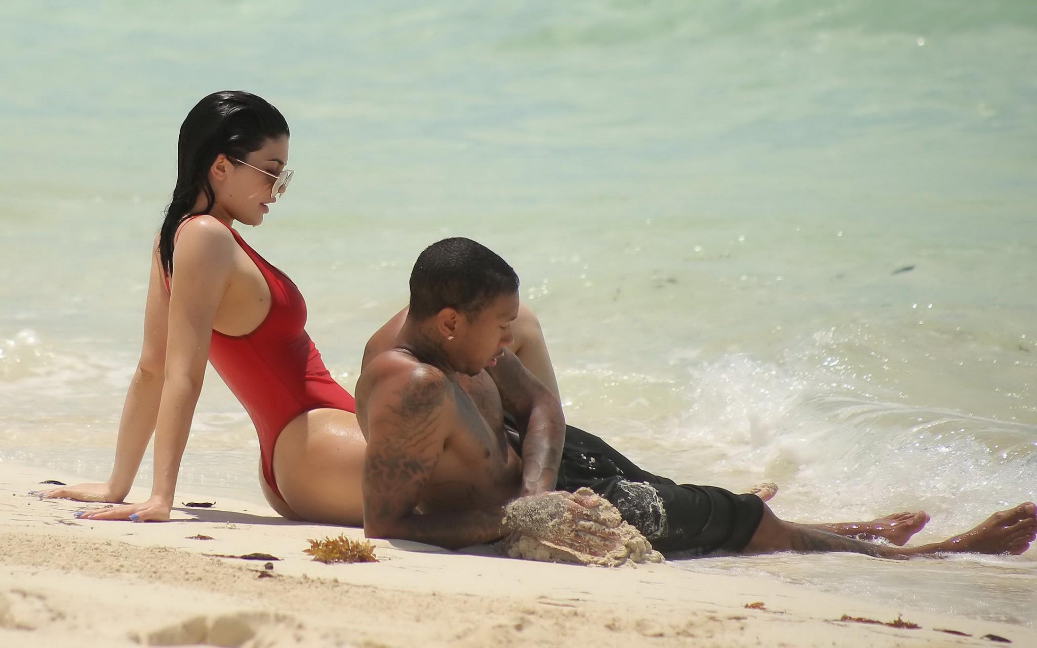 16P Kylie Jenner shows off her hot round ass in red swimsuit