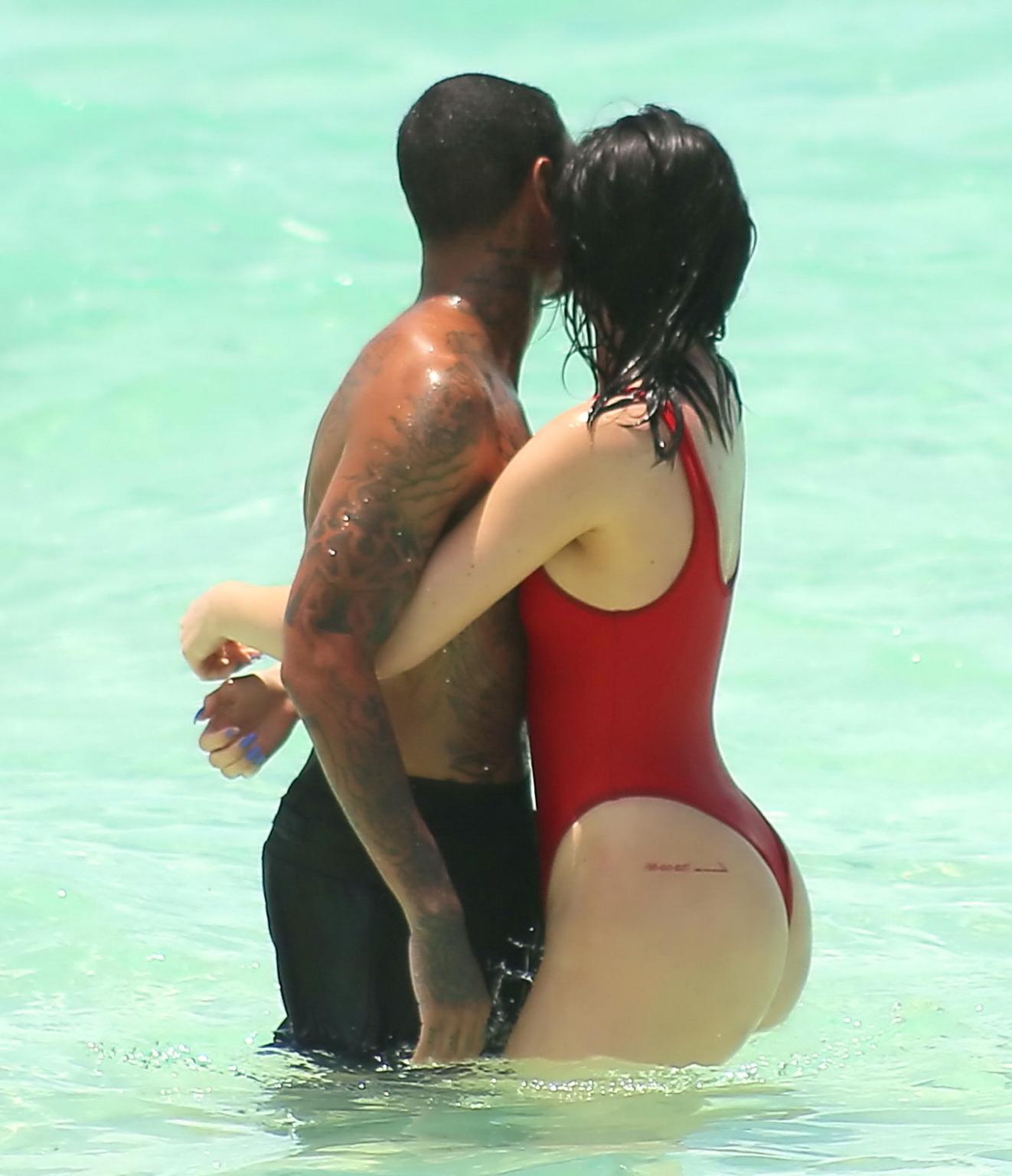 16P Kylie Jenner shows off her hot round ass in red swimsuit