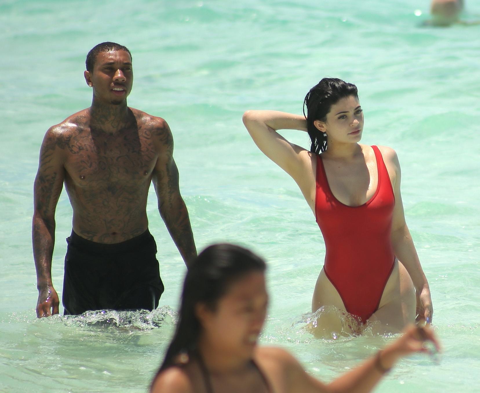 16P Kylie Jenner shows off her hot round ass in red swimsuit