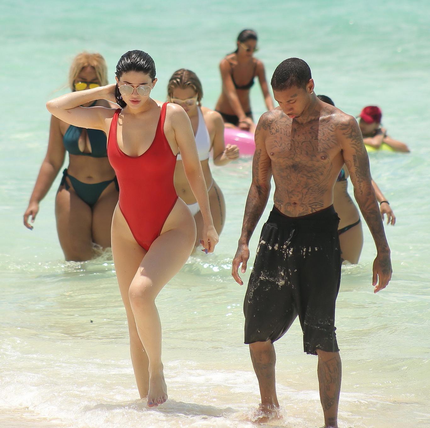 16P Kylie Jenner shows off her hot round ass in red swimsuit