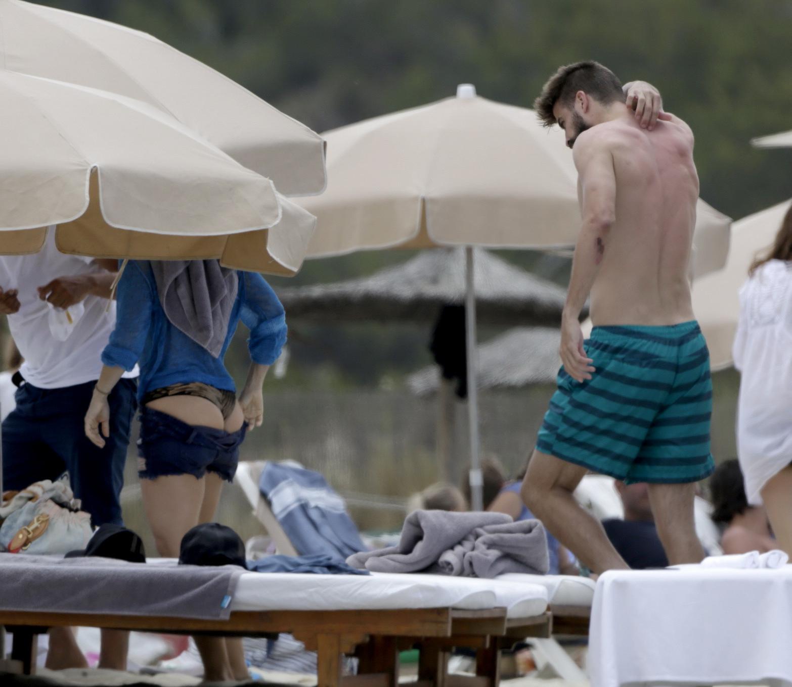 16P Shakira in a skimpy thong bikini at the beach