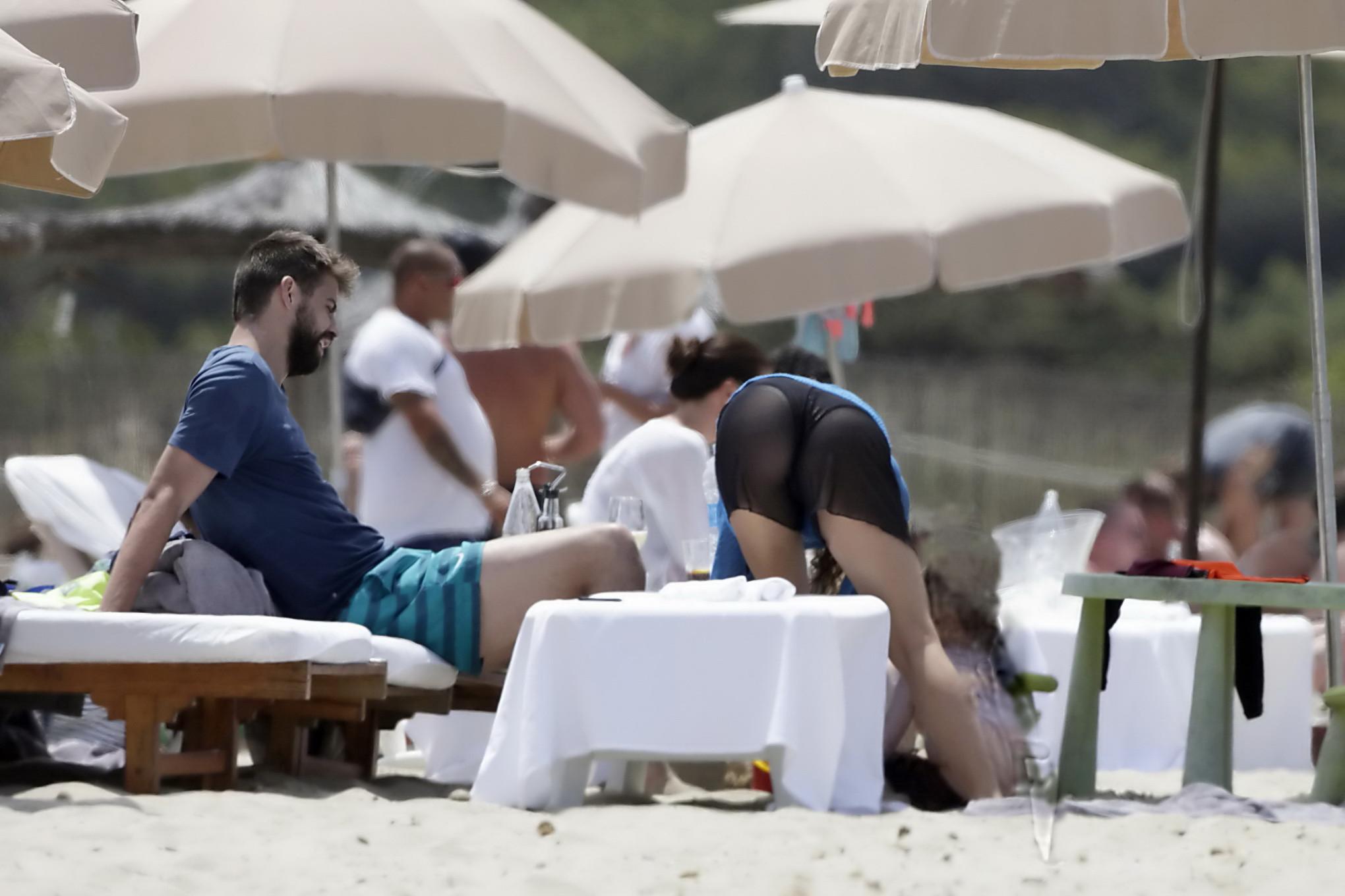 16P Shakira in a skimpy thong bikini at the beach